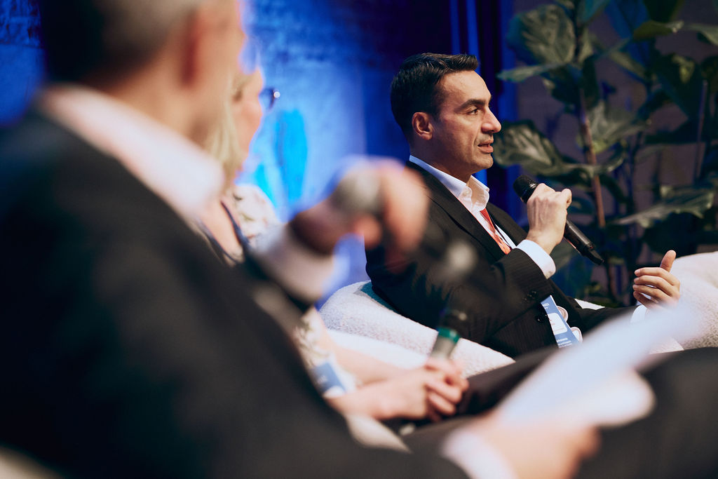 Man is holding a microphone