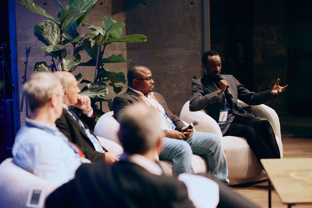 people sitting in chairs and discussing